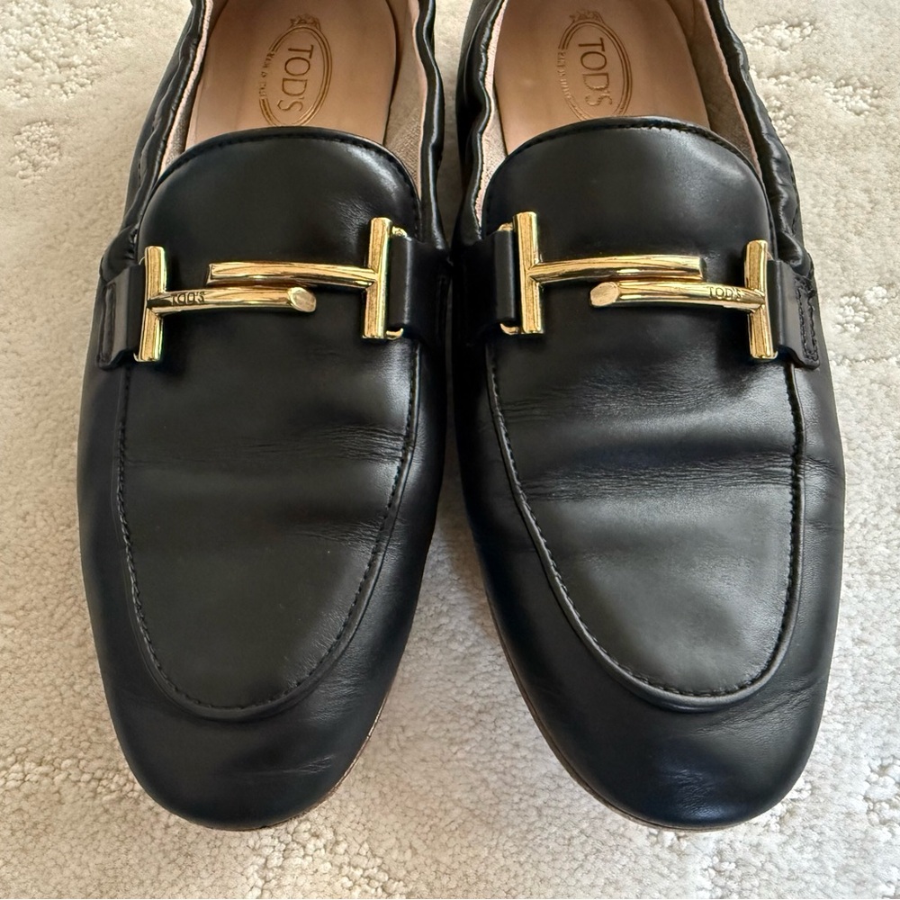Tod's Black Leather Loafers with Gold-Tone Hardware